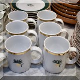 K03. Set of Eddie Bauer pine cone dessert plates (8) and mugs (6) - $65